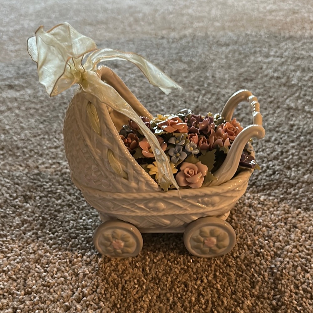 Floral Overflow Baby Carriage with Ribbon and hanging Booties